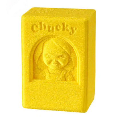 Yellow block with a face design and 'Chucky' text on a white background