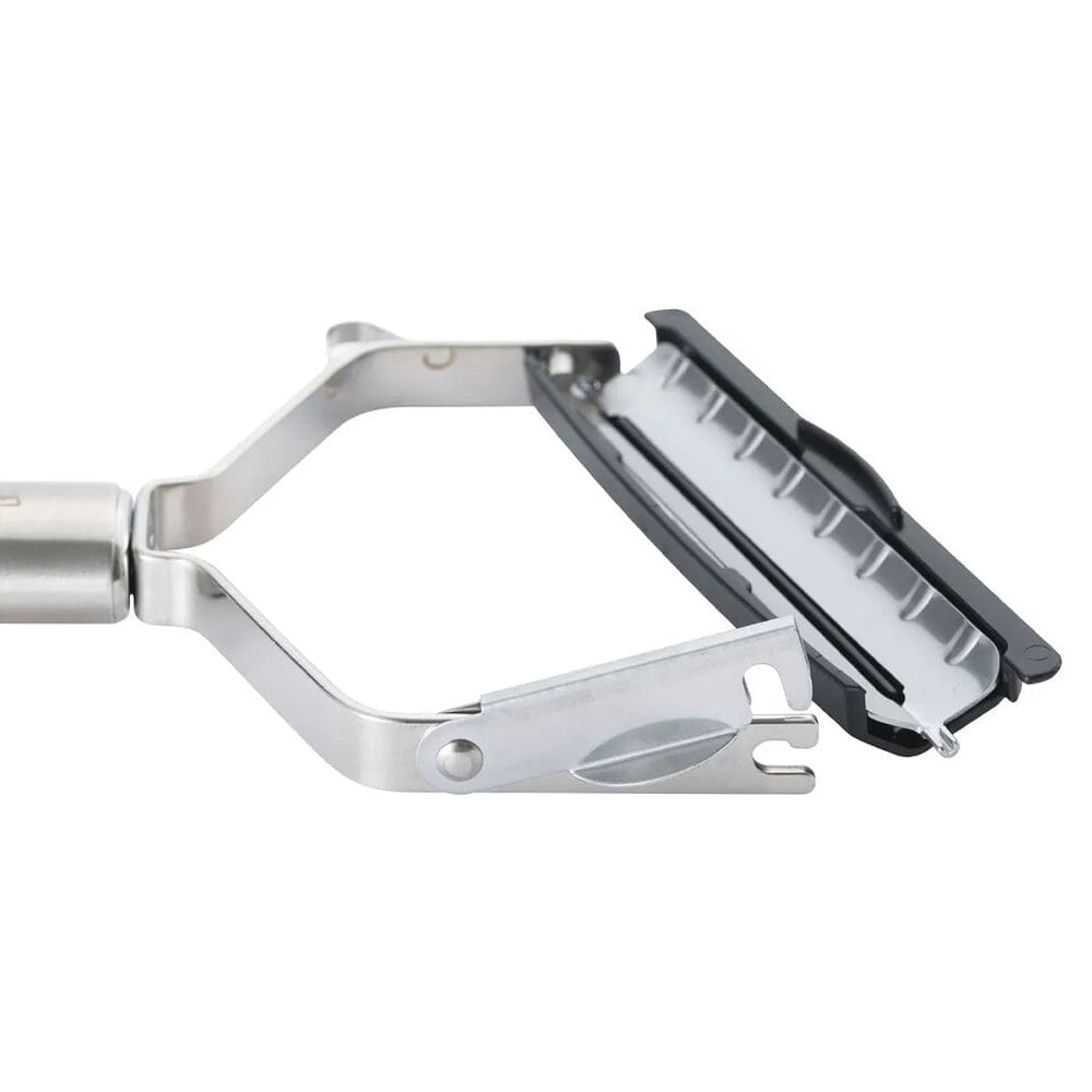 Close-up of a safety razor with a white background