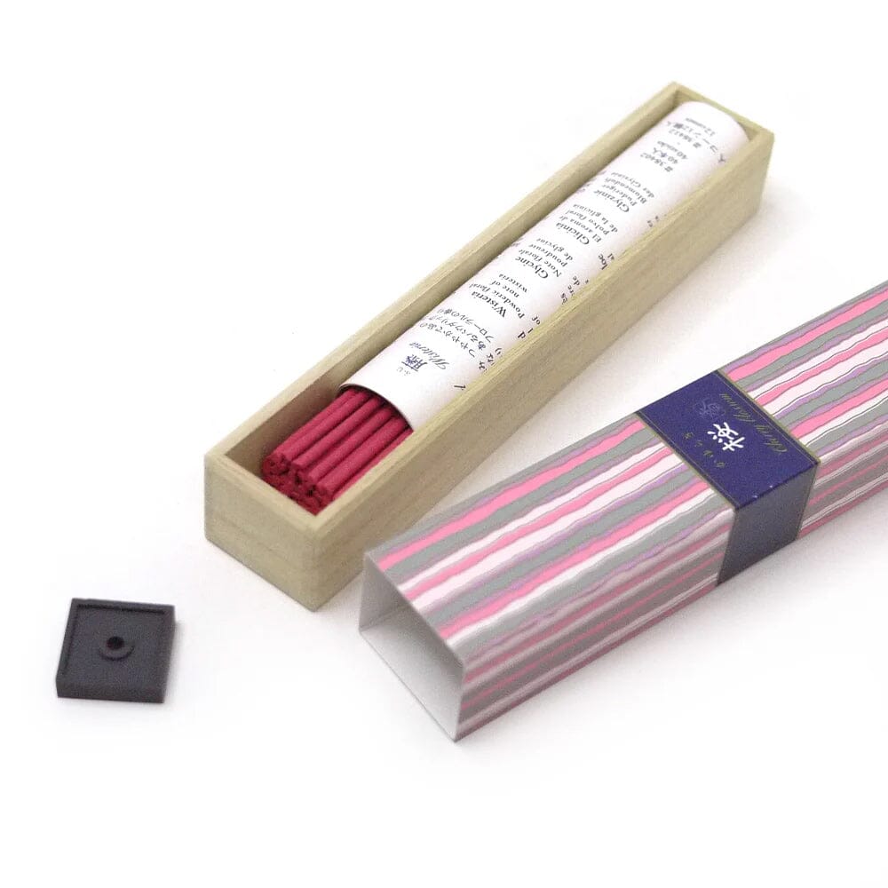 Set of incense sticks with packaging on a white background